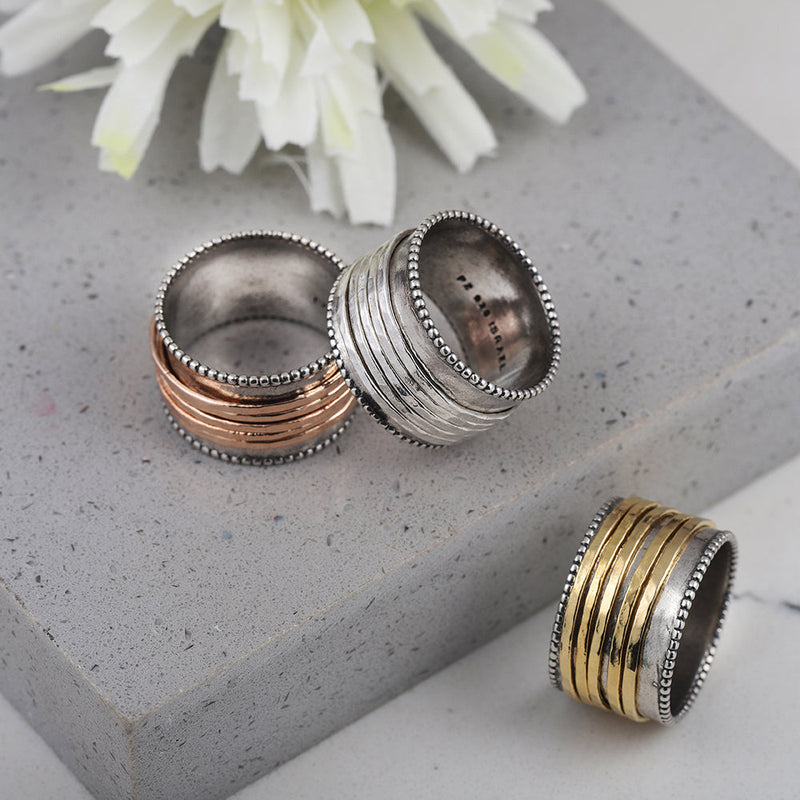 Spinner Ring with Five Spinners dannynewfeldjewelry